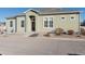 Attractive ranch style home with a landscaped front yard and driveway at 6916 Crestop Pl # A, Parker, CO 80138