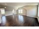 Spacious bonus room featuring hardwood floors, recessed lighting, and multiple windows providing ample natural light at 6023 Chester Way, Denver, CO 80238
