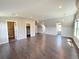 Spacious bonus room with hardwood floors, dormer windows, and recessed lighting at 6023 Chester Way, Denver, CO 80238