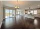 Open-concept living room seamlessly connects to the kitchen, perfect for entertaining and Gathering gatherings at 6023 Chester Way, Denver, CO 80238