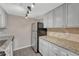 Kitchen featuring stainless steel appliances, granite countertops and lots of cabinet space at 3337 S Monaco Pkwy # C, Denver, CO 80222