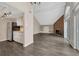 Open layout featuring the kitchen, living room and dining area at 3337 S Monaco Pkwy # C, Denver, CO 80222