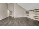 Open living room showcasing modern flooring and neutral wall colors at 3337 S Monaco Pkwy # C, Denver, CO 80222