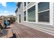 Backyard deck featuring stone supports, wood surface, and ample space for seating and entertaining at 24022 E Jamison Dr, Aurora, CO 80016
