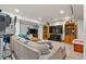 Large finished basement featuring comfortable seating area and large screen television and home entertainment system at 24022 E Jamison Dr, Aurora, CO 80016