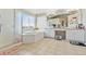 Spacious bathroom featuring large soaking tub, tile floors, and a separate shower, ideal for relaxation at 24022 E Jamison Dr, Aurora, CO 80016