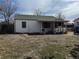 View of the home and backyard, showing the backyard and exterior features of the property at 7080 Cherry St, Commerce City, CO 80022