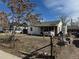 View of the home and front yard, showing the front yard and exterior features of the property at 7080 Cherry St, Commerce City, CO 80022