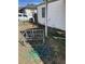 View of the home and side yard, showing the side yard and exterior features of the property at 7080 Cherry St, Commerce City, CO 80022