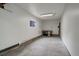 Unfinished basement space that could be a perfect workshop with workbench and window at 5271 S Logan St, Littleton, CO 80121