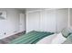 Cozy bedroom features with closet space, updated flooring, and neutral color palette at 5271 S Logan St, Littleton, CO 80121