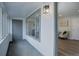 Bright foyer with gray tile, large windows and a full view into the living spaces at 5271 S Logan St, Littleton, CO 80121