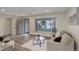 Bright living room featuring modern decor, natural light, and open layout at 5271 S Logan St, Littleton, CO 80121