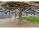 View of backyard showing a tree house and a fenced-in area at 835 S Shoshone St, Denver, CO 80223