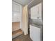 Laundry area with new stackable washer and dryer and neutral color scheme at 835 S Shoshone St, Denver, CO 80223