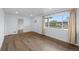 Inviting living room features bright light and spacious design, with wood floors at 835 S Shoshone St, Denver, CO 80223