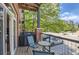 Relaxing balcony area with comfortable seating, grill, and a view of the neighborhood at 5401 S Park Terrace Ave # 109A, Greenwood Village, CO 80111