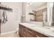 Modern bathroom featuring a marble countertop, stylish vanity, and elegant fixtures at 5401 S Park Terrace Ave # 109A, Greenwood Village, CO 80111