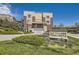 Attractive condo building with well-maintained landscaping and prominent signage, creating a welcoming atmosphere at 5401 S Park Terrace Ave # 109A, Greenwood Village, CO 80111