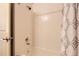 Clean bathroom shower with white tile and shower curtain perfect for simple and easy cleaning at 5401 S Park Terrace Ave # 109A, Greenwood Village, CO 80111