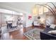 Inviting living room area open to the dining room with lots of natural light at 6726 S Franklin St, Centennial, CO 80122