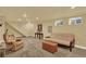 Finished basement with neutral walls and carpet, recessed lighting, and easy access to the basement stairs at 7631 Oak St, Arvada, CO 80005