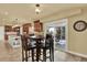 Breakfast nook featuring a view to the outside patio via sliding glass doors at 7631 Oak St, Arvada, CO 80005