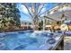 Hot tub with outdoor patio and view at 7631 Oak St, Arvada, CO 80005