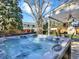 Relaxing hot tub in a serene backyard setting offers a private retreat for unwinding and enjoying the outdoors at 7631 Oak St, Arvada, CO 80005