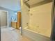 Bathroom features a shower, toilet, and vanity with ample storage space at 2118 S Mobile Way, Aurora, CO 80013