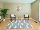 Stylish living room features trendy seating arrangement, modern decor and neutral paint at 2118 S Mobile Way, Aurora, CO 80013