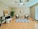Inviting living room with hardwood floors, neutral walls, and decorative furniture at 2118 S Mobile Way, Aurora, CO 80013