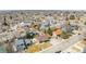 Neighborhood aerial view showing the property with a lawn and surroundings with convenient access to local amenities at 6343 Depew St, Arvada, CO 80003
