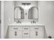 Modern bathroom with double vanity, updated fixtures and a large mirror at 2707 Valmont Rd # 106B, Boulder, CO 80304