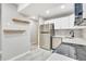 Modern kitchen with white cabinets and stainless steel appliances at 2707 Valmont Rd # 106B, Boulder, CO 80304