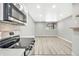 Bright living room with hardwood floors and a window at 2707 Valmont Rd # 106B, Boulder, CO 80304