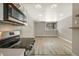 Bright living room with hardwood floors and a window at 2707 Valmont Rd # 106B, Boulder, CO 80304