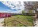 View of the backyard featuring the storage shed and partially enclosed garden at 3310 W 95Th Ave, Westminster, CO 80031