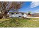 Backyard view with small patio and nice grassy area at 3310 W 95Th Ave, Westminster, CO 80031