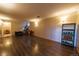 Spacious basement featuring new vinyl plank flooring, wood paneled walls, and overhead lighting at 3310 W 95Th Ave, Westminster, CO 80031