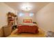 Bedroom with cozy bed, light colored walls, and wood floor at 3310 W 95Th Ave, Westminster, CO 80031