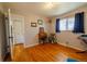 Spacious bedroom featuring hardwood floors, closet, and plenty of natural light at 3310 W 95Th Ave, Westminster, CO 80031