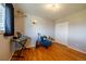 Comfortable bedroom with hardwood floors and closet at 3310 W 95Th Ave, Westminster, CO 80031