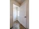 Bright entryway featuring tile floors, white trim, and an exterior door with window panes at 3310 W 95Th Ave, Westminster, CO 80031