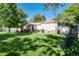 This home boasts a lush, well-maintained backyard, perfect for entertaining or relaxing outdoors at 5215 S Washington St, Littleton, CO 80121