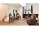 Inviting sitting room with comfortable seating, decor, and a faux fireplace at 5215 S Washington St, Littleton, CO 80121