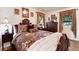 Cozy bedroom with a comfortable bed, side tables, and windows allowing natural light at 5215 S Washington St, Littleton, CO 80121