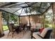 Inviting outdoor covered patio with comfortable seating, perfect for entertaining at 5215 S Washington St, Littleton, CO 80121