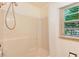 Bright shower with window at 5215 S Washington St, Littleton, CO 80121