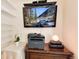 TV mounted above printer and desk in bedroom at 5215 S Washington St, Littleton, CO 80121